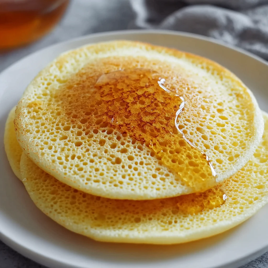 How To Make Baghrir At Home Best Moroccan Semolina Pancakes Recipe Fluffy Baghrir Pancakes Cooking Tips Delicious Baghrir ...